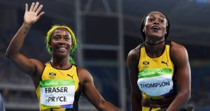 RIO DE JANEIRO, BRAZIL - AUGUST 13:  Elaine Thompson (R) of Jamaica celebrates winning the Women's 100m Final with Shelly-Ann Fraser-Pryce of Jamaica on Day 8 of the Rio 2016 Olympic Games at the Olympic Stadium on August 13, 2016 in Rio de Janeiro, Brazil.  (Photo by Shaun Botterill/Getty Images)